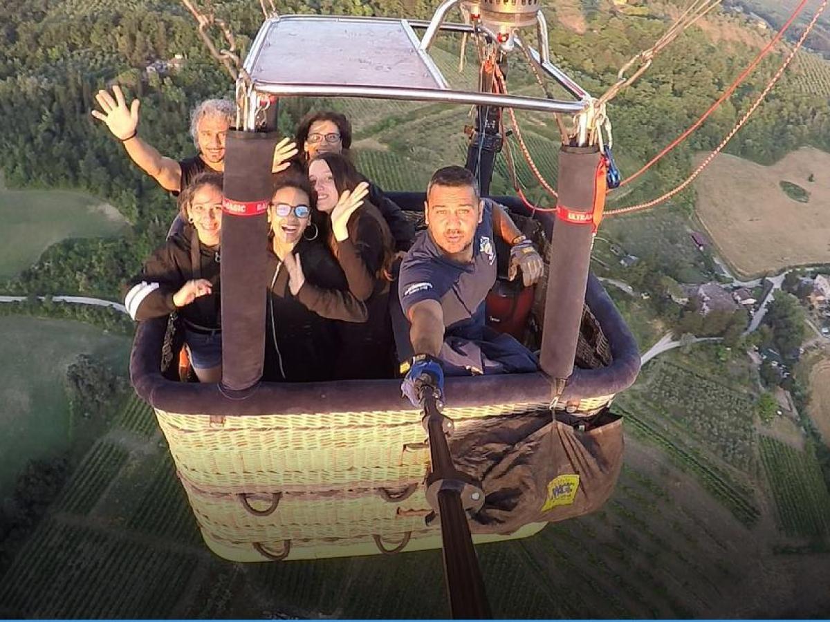 a group of people riding on the back of a boat
