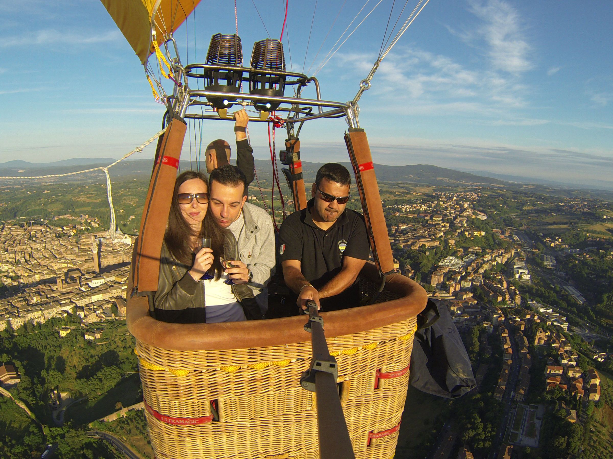 a person standing next to a body of water